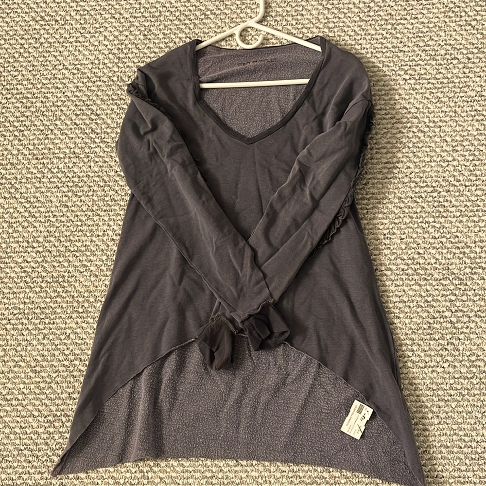 R and R surplus top ruffle sleeve distressed look top.